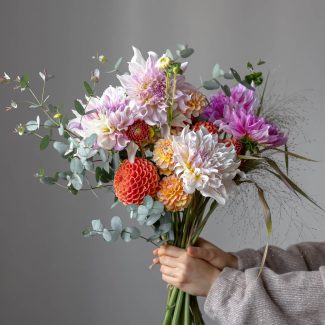 woman-is-holding-festive-bouquet-with-chrysathemum-flowers-her-hands (1)